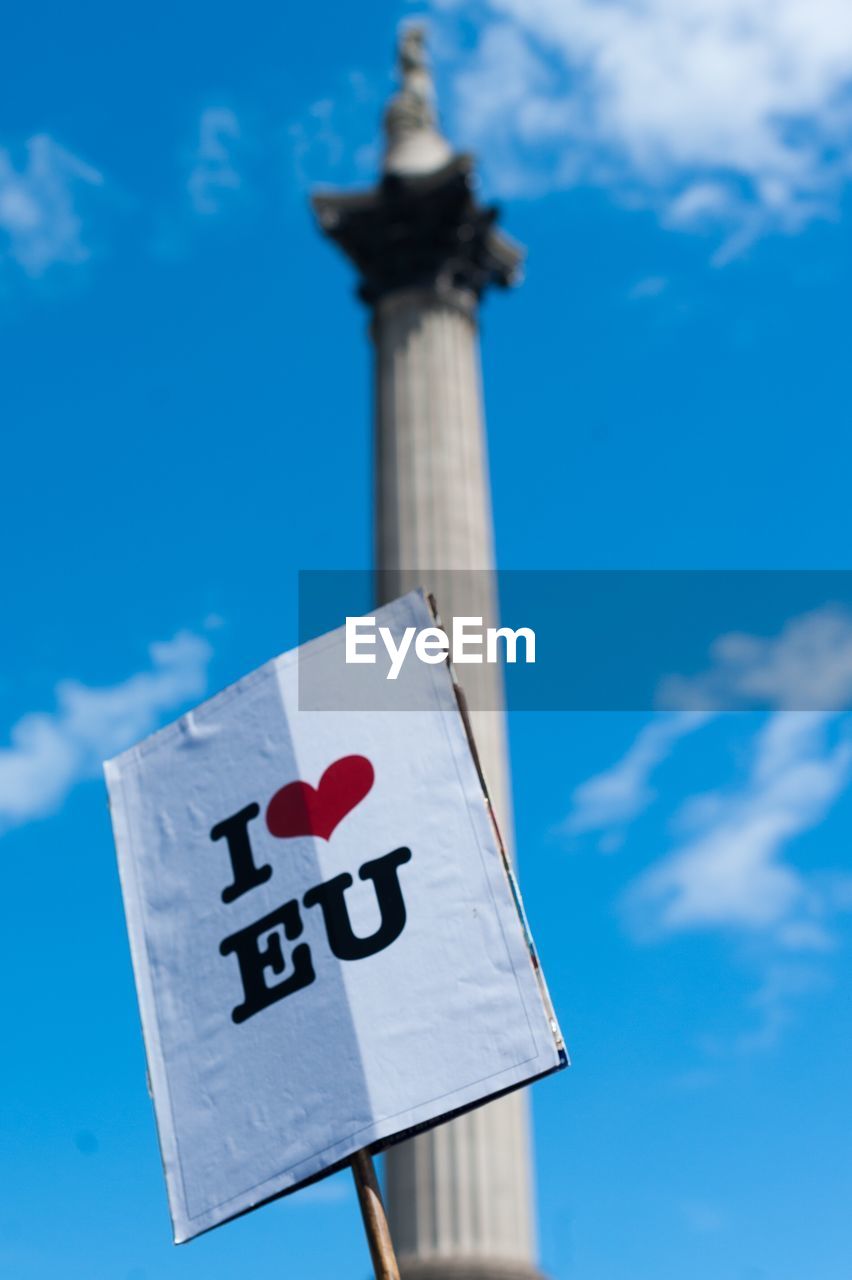 Close-up of i love europe sign in front of column