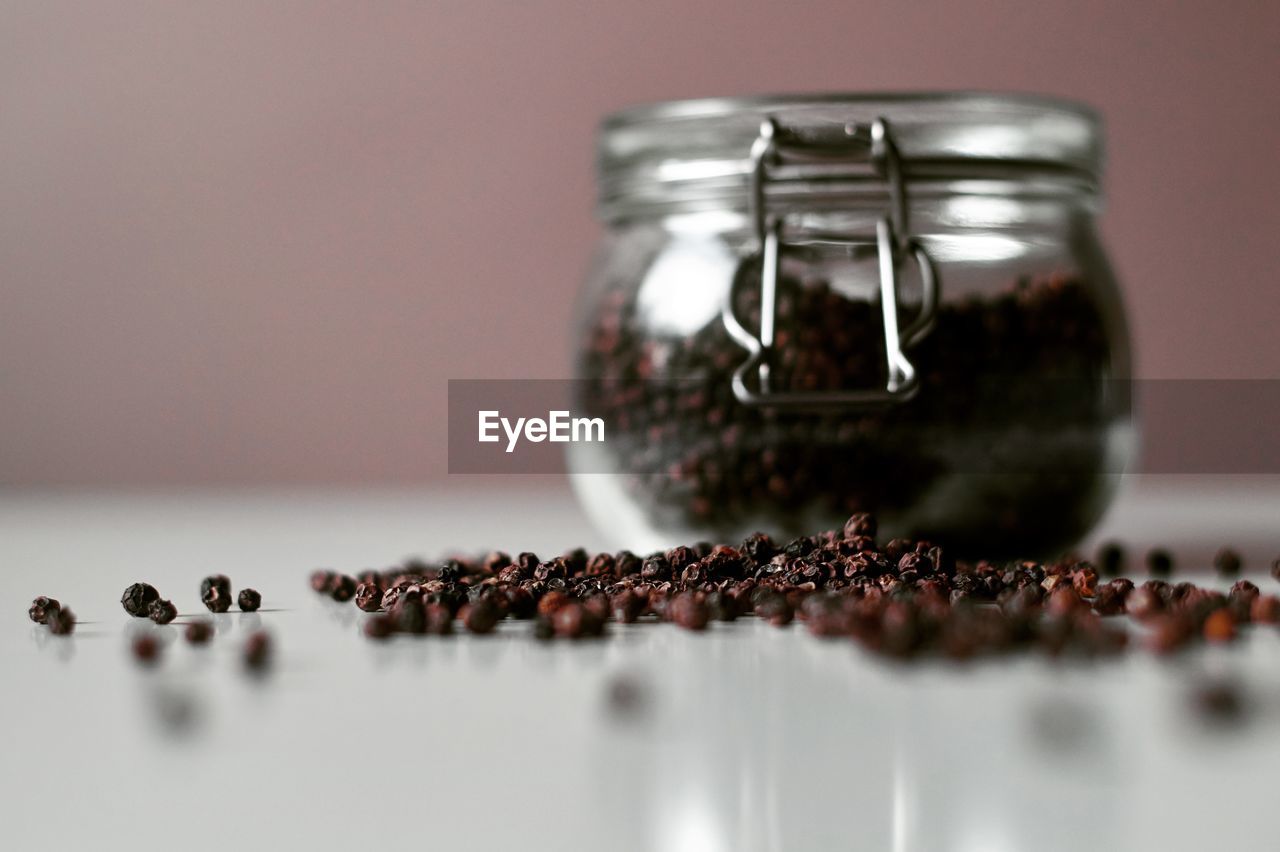 Close-up of coffee beans on table