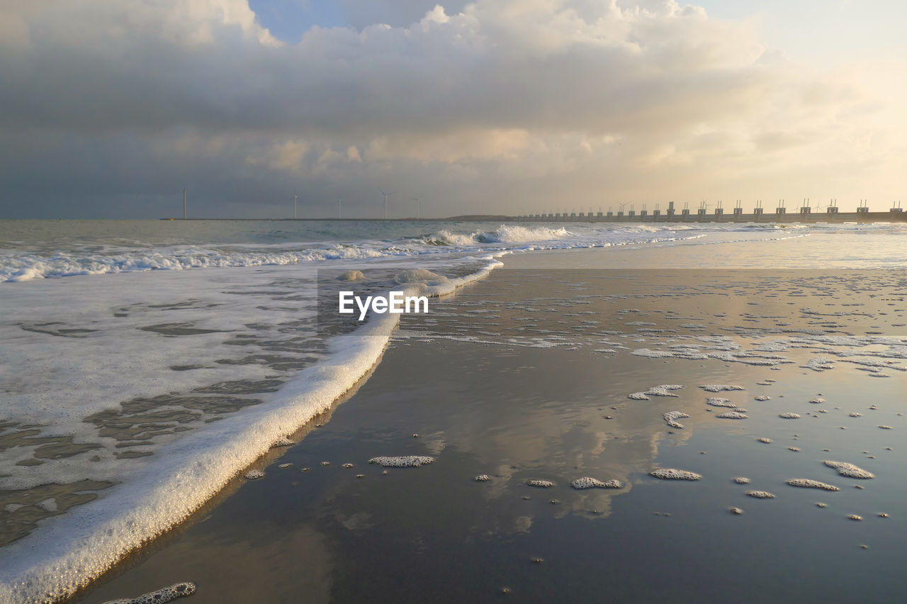 Scenic view of beach against sky