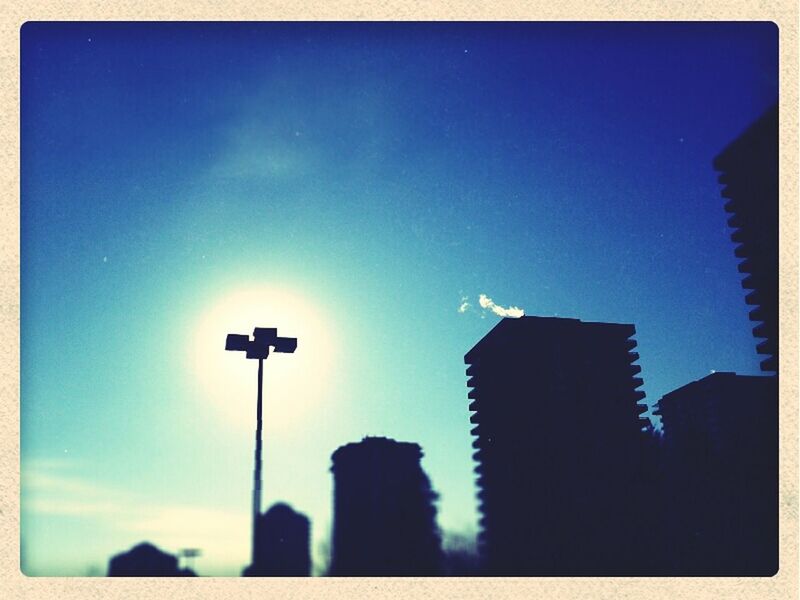 LOW ANGLE VIEW OF STREET LIGHT AGAINST BLUE SKY