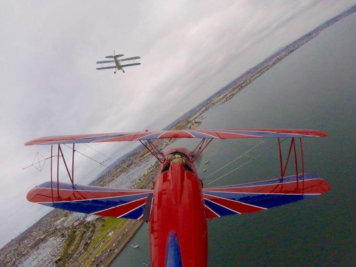 LOW ANGLE VIEW OF AIRPLANE IN SKY