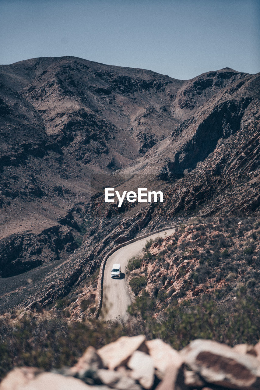 Aerial view of mountain road against sky