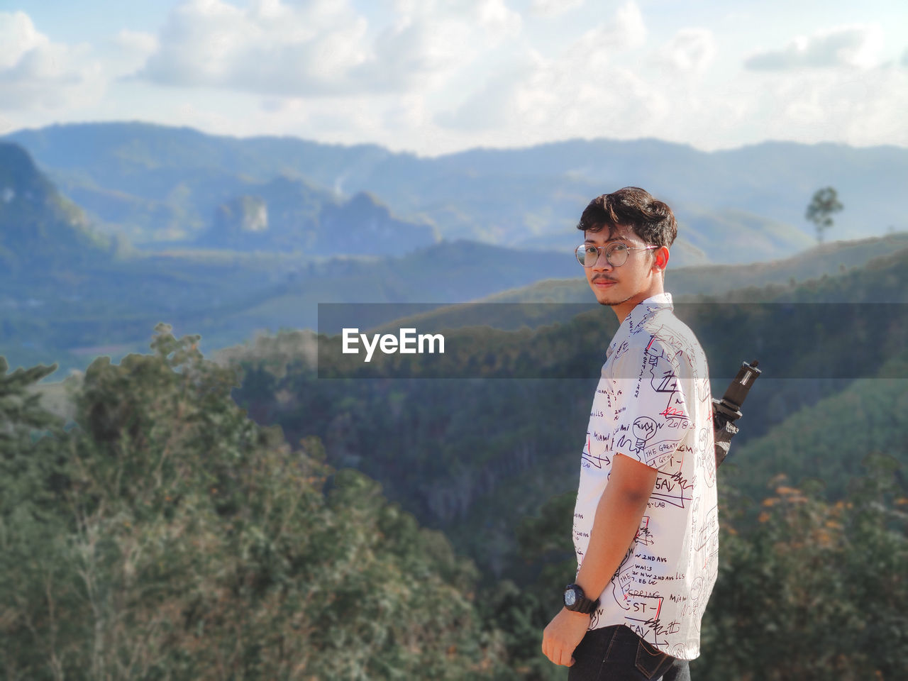 Young man looking at mountains