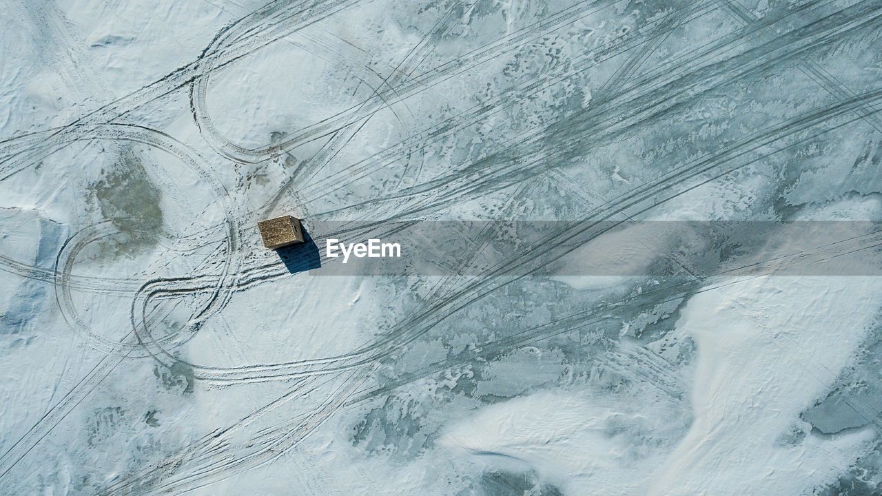 High angle view of snow covered field during winter