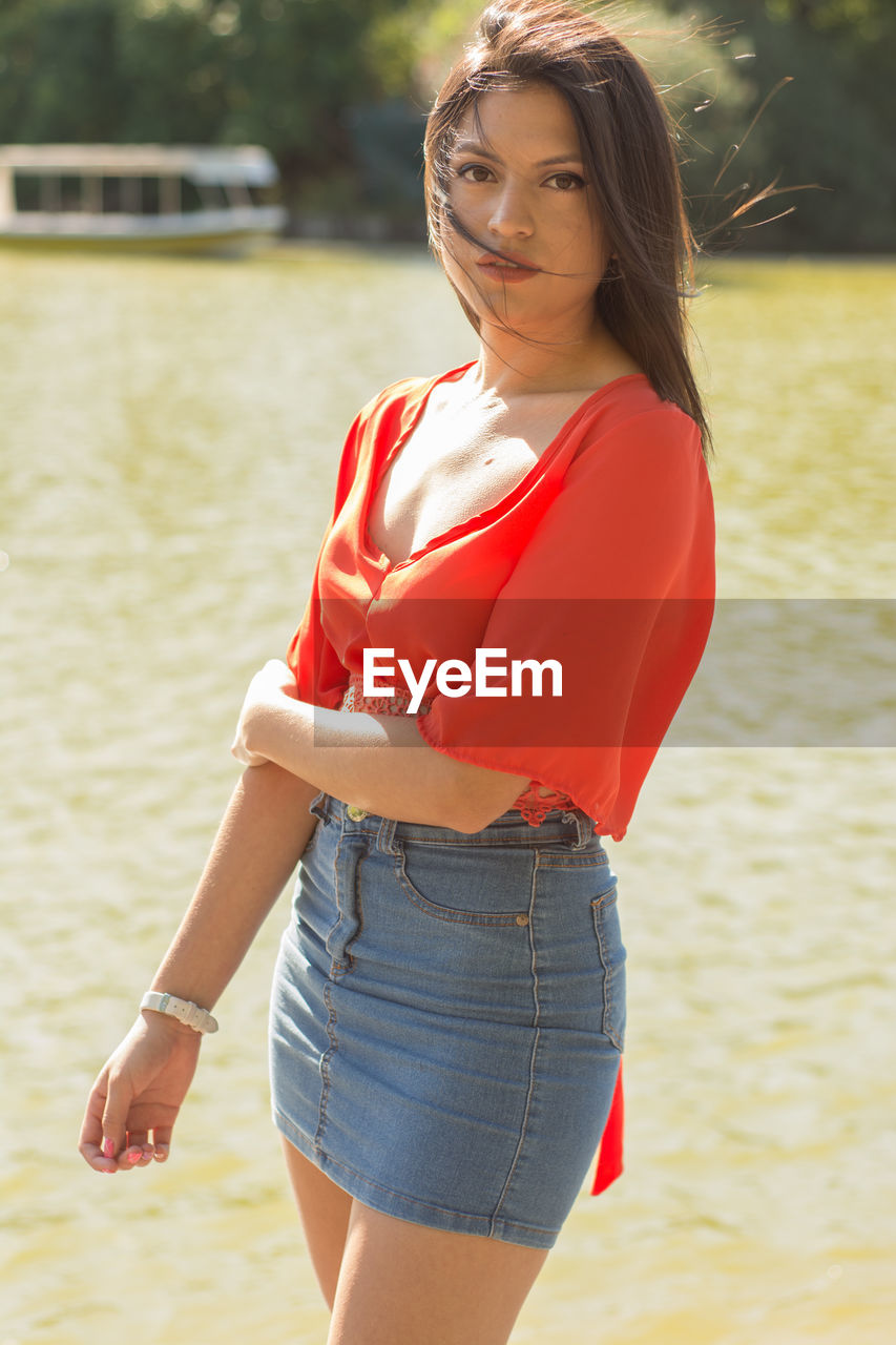 Model woman looking at camera during outdoors session