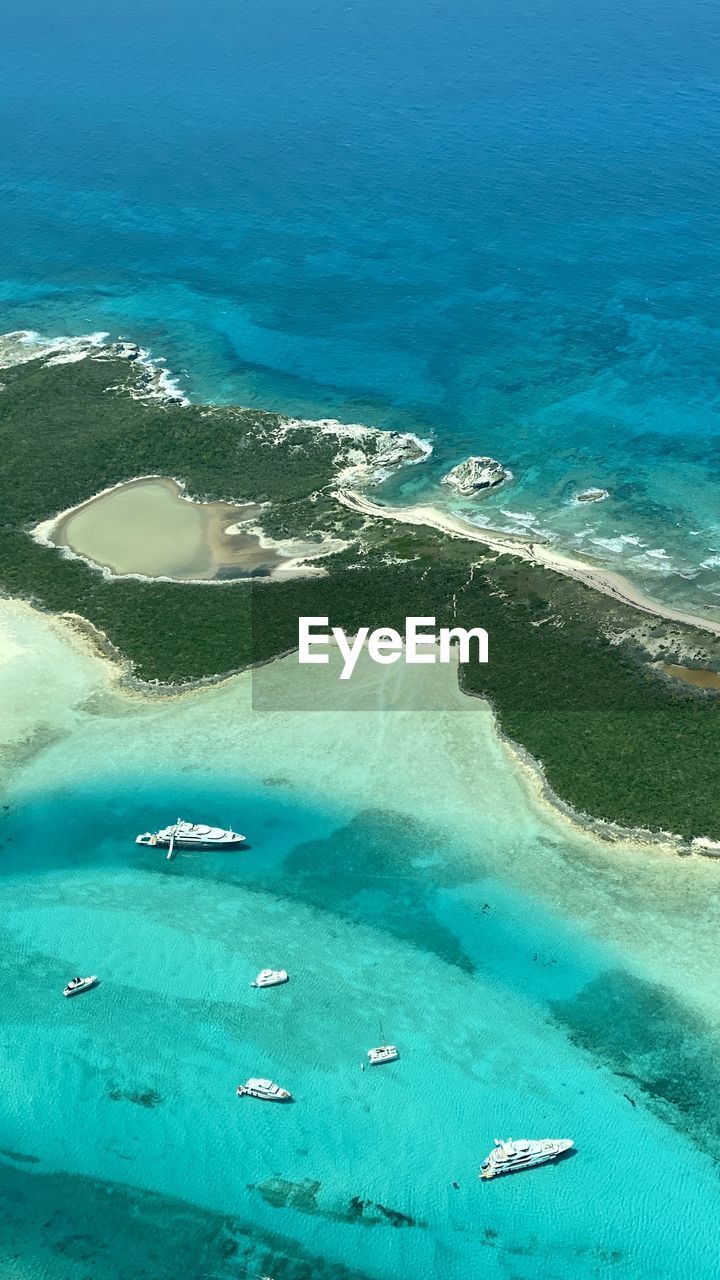 HIGH ANGLE VIEW OF SEA AND SHORE