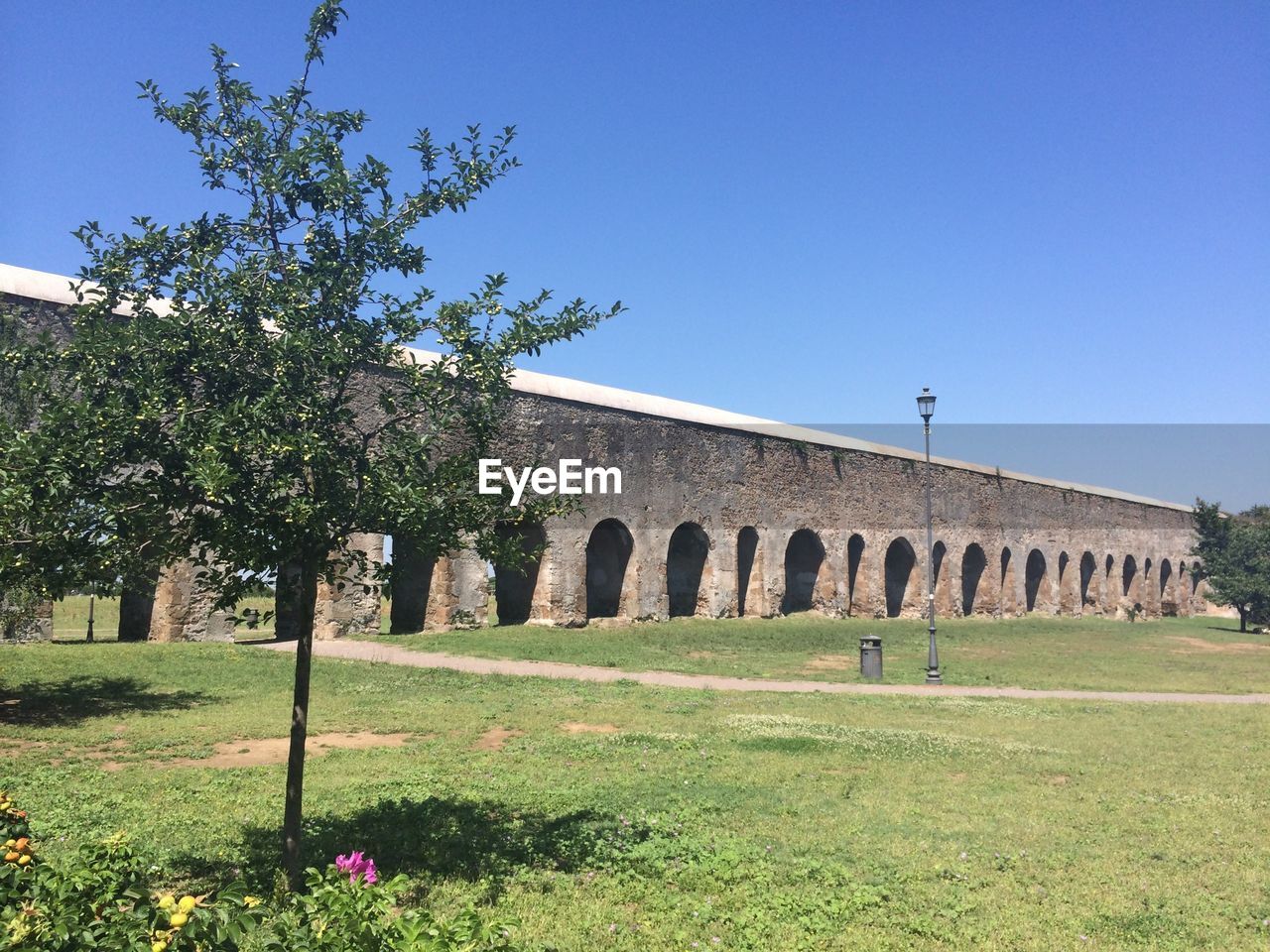 View of surrounding wall against the blue sky