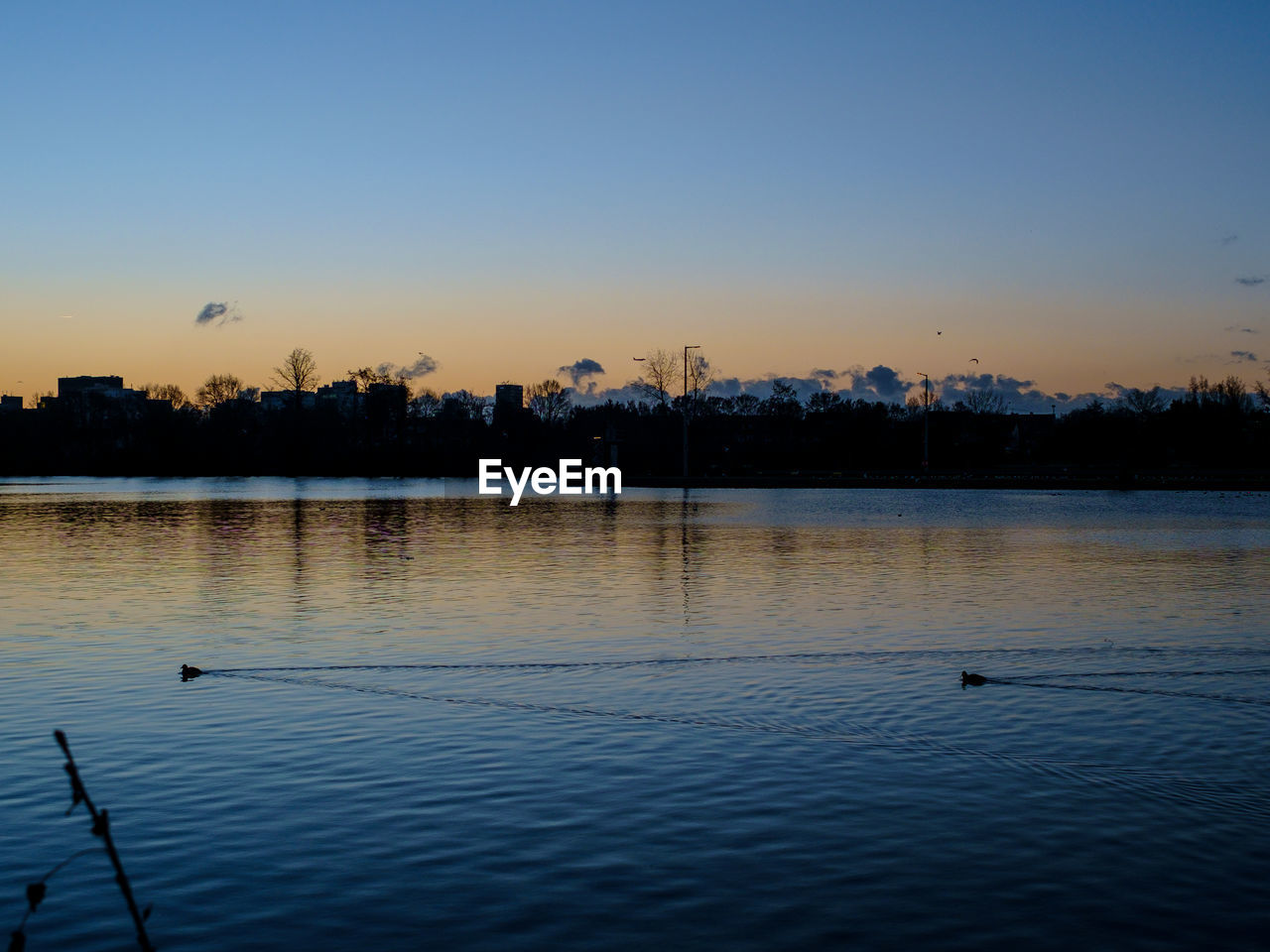 VIEW OF LAKE AT SUNSET