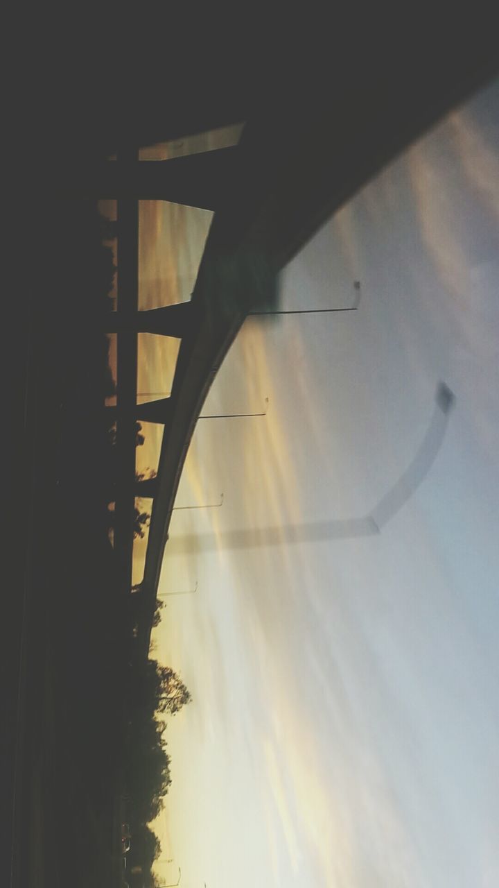 VIEW OF BRIDGE AT SUNSET