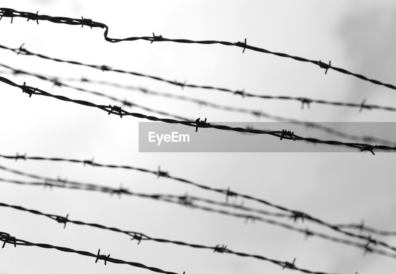 BARBED WIRE AGAINST SKY
