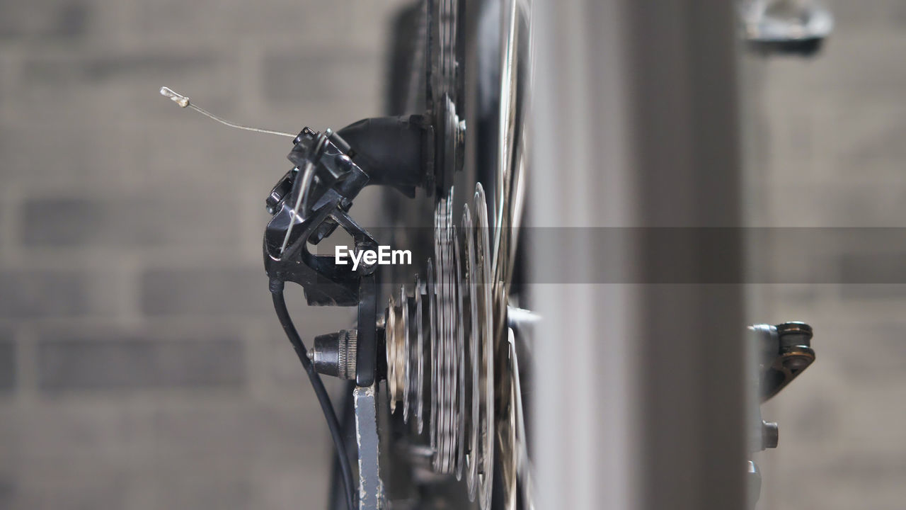 focus on foreground, bicycle, vehicle, no people, close-up, iron, metal, day, selective focus