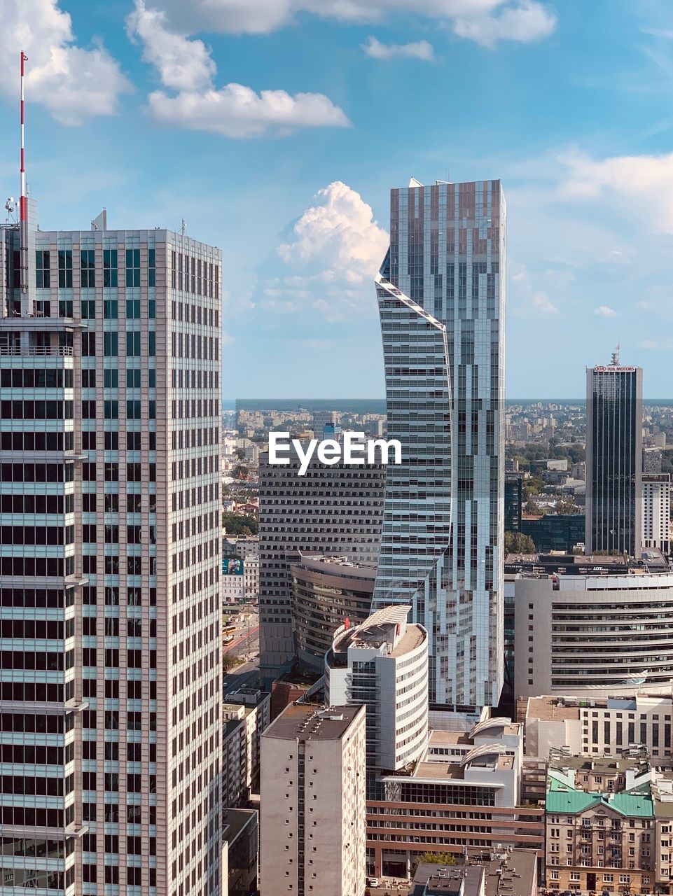 Modern buildings in city against sky