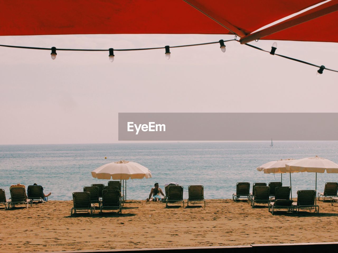 SCENIC VIEW OF BEACH AGAINST CLEAR SKY