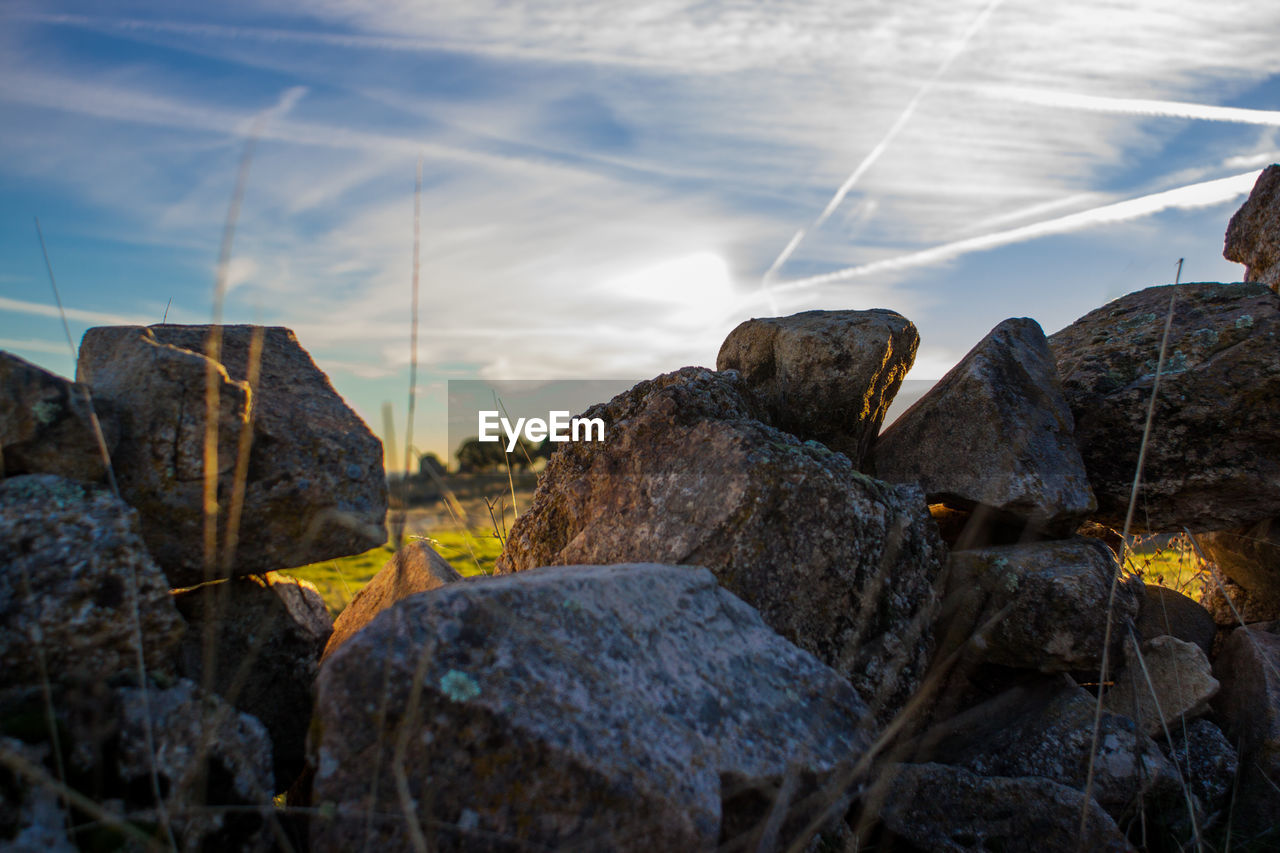 Close-up of rocks against sky