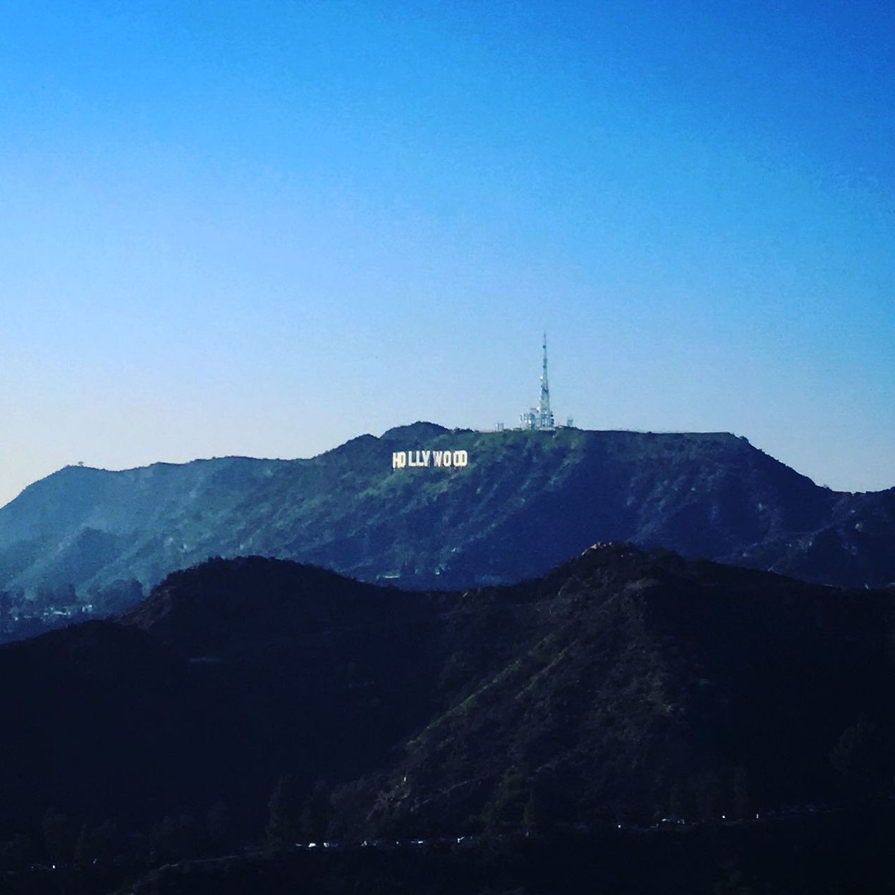 SCENIC VIEW OF MOUNTAINS AGAINST CLEAR SKY