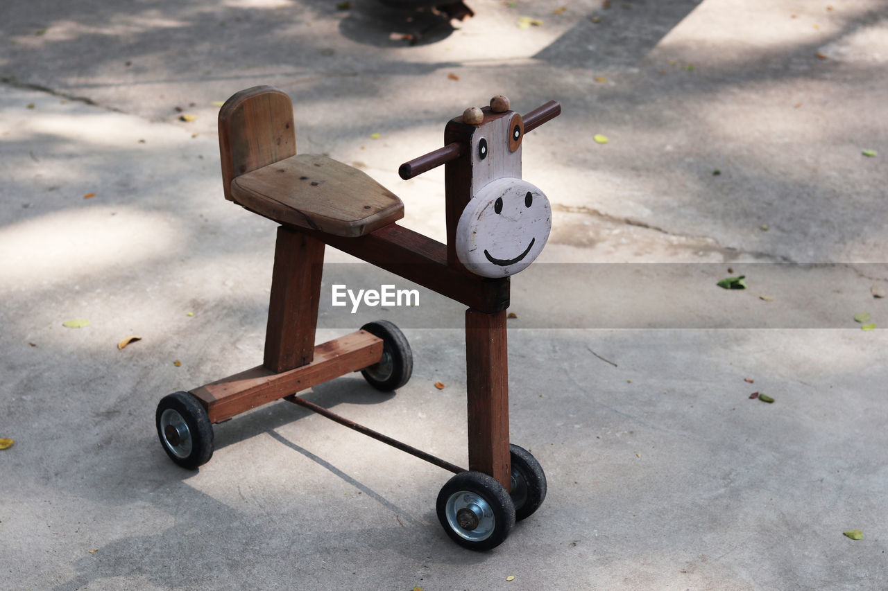 High angle view of tricycle on footpath