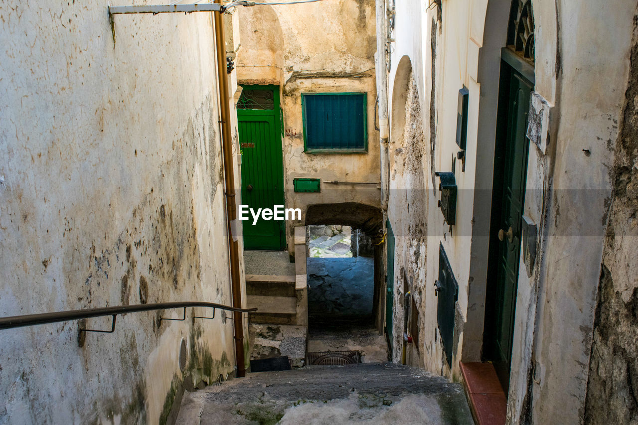 Narrow alley amidst old building, in amalfi