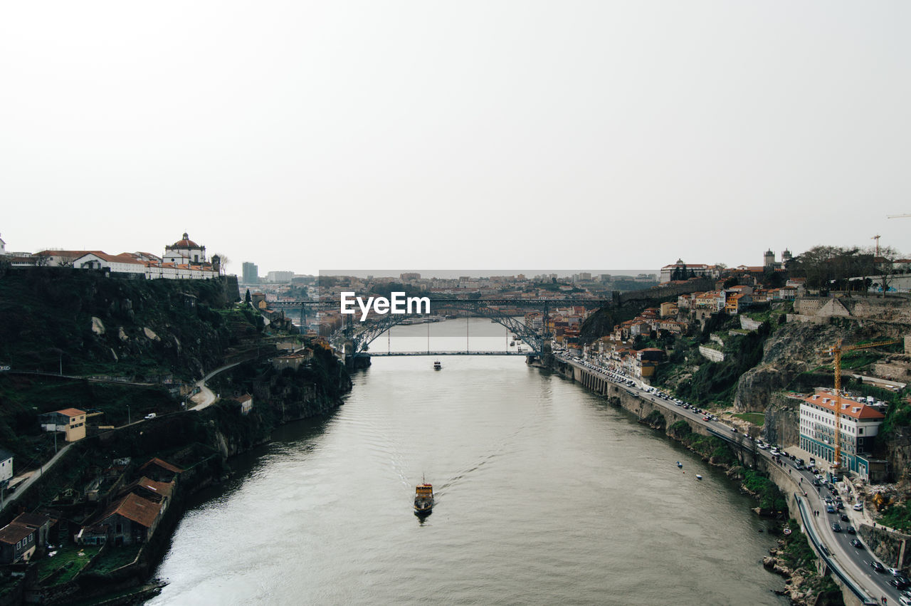 High angle view of douro river amidst buildings against sky