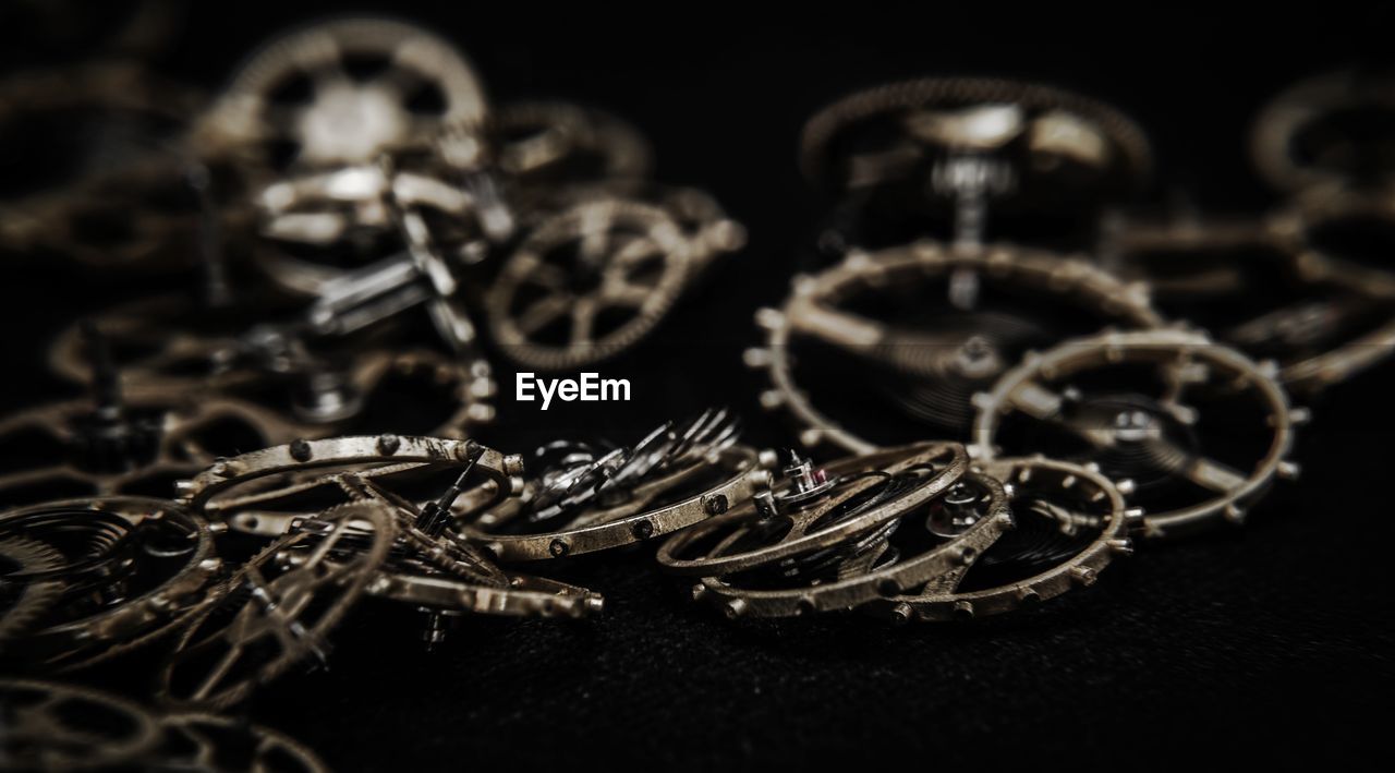 Close view of a old toothed wheels watch mechanism with jewels