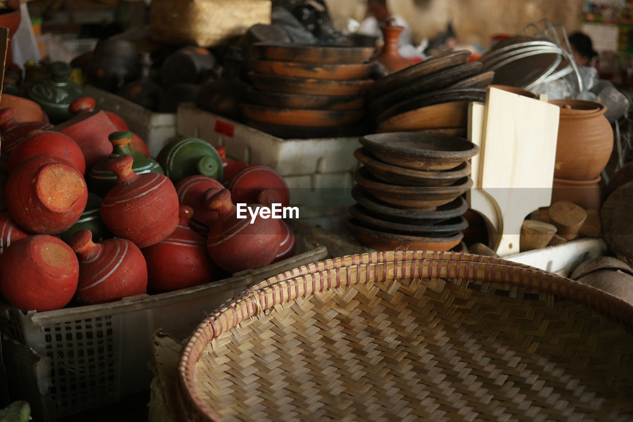 Earthenware for sale at market stall