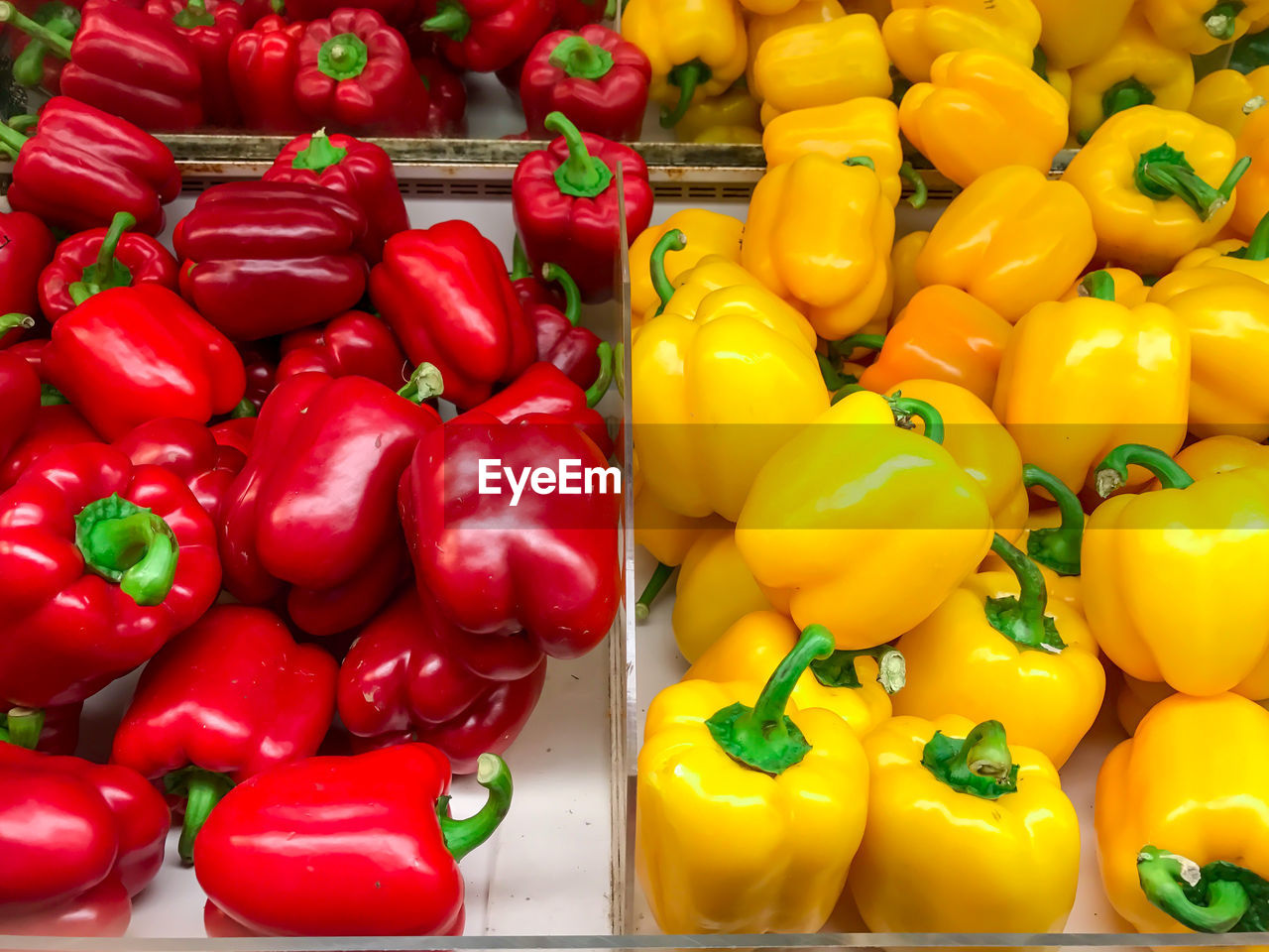 CLOSE-UP OF RED BELL PEPPERS FOR SALE IN MARKET