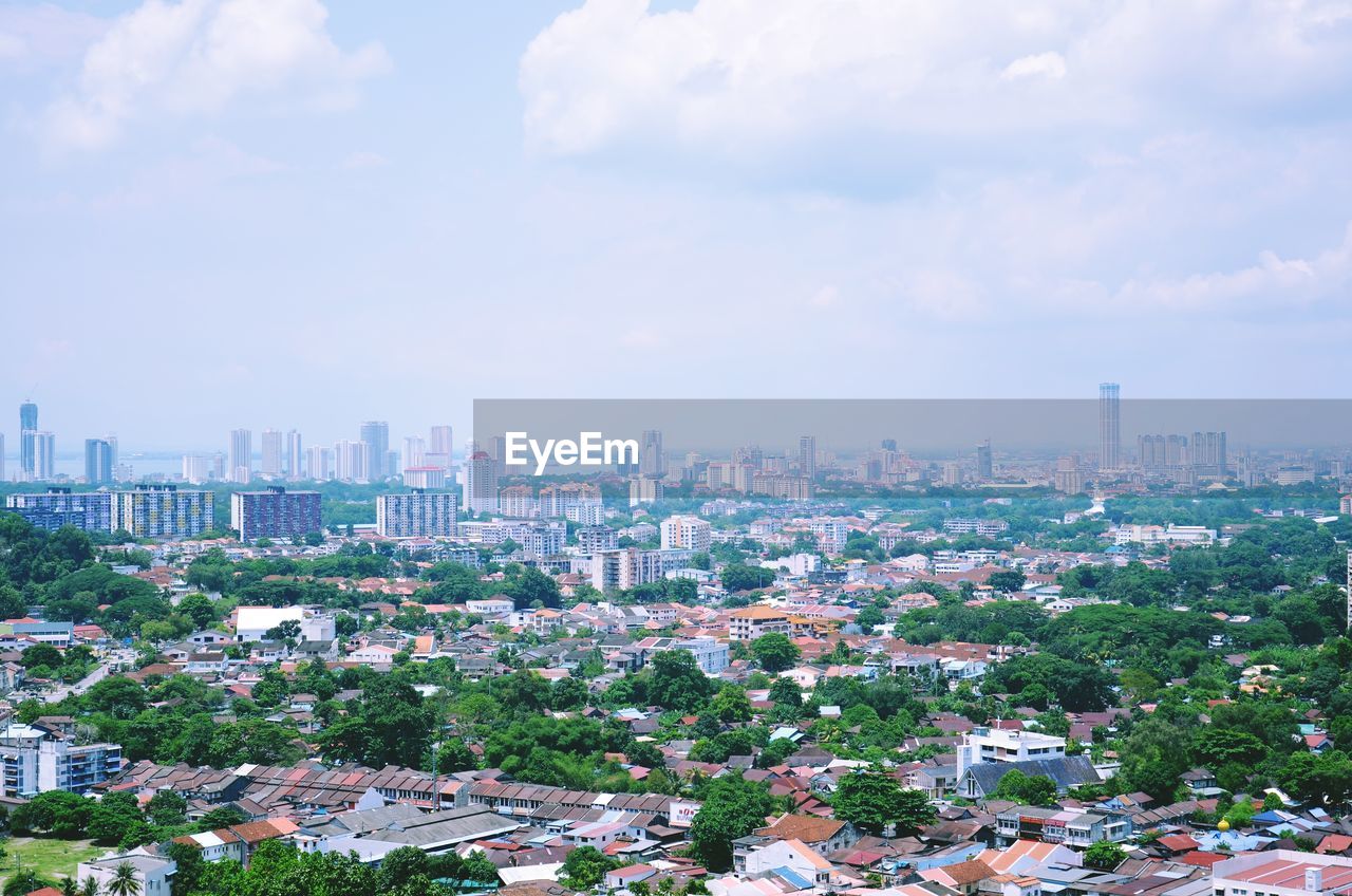 AERIAL VIEW OF CITY AGAINST SKY