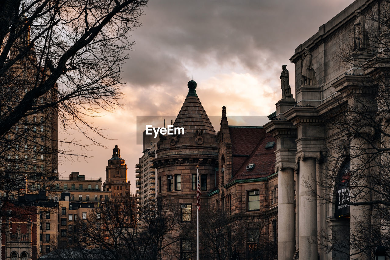 BUILDINGS AGAINST SKY DURING SUNSET