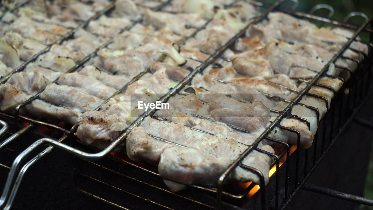 Barbecue with delicious grilled meat on the grill.barbecue meat is fried grill grate.