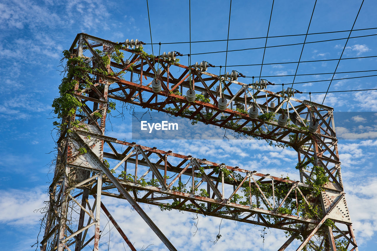 low angle view of electricity pylon against clear sky