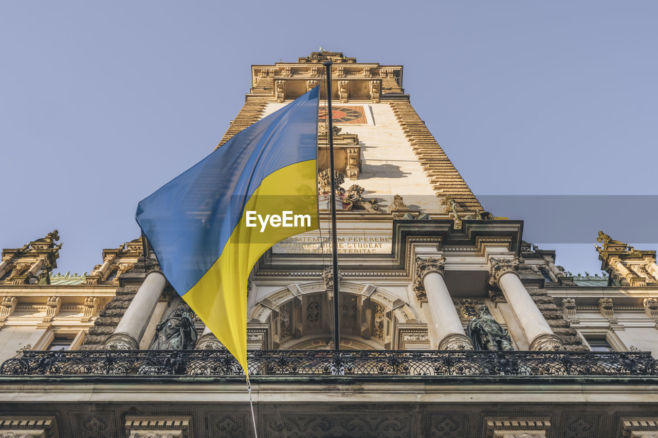 Germany, hamburg, ukrainian flag hanging on hamburg city hall