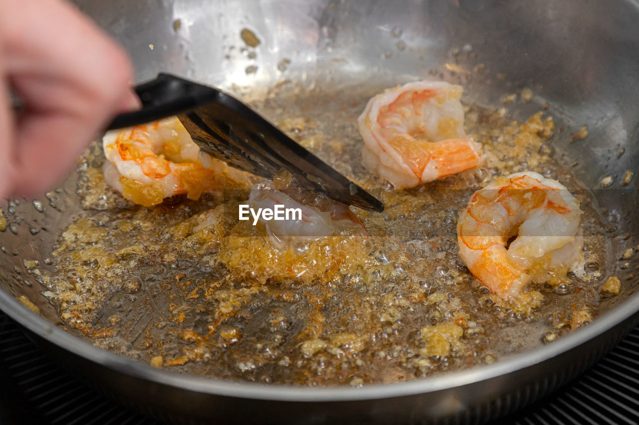 Close-up of person preparing food