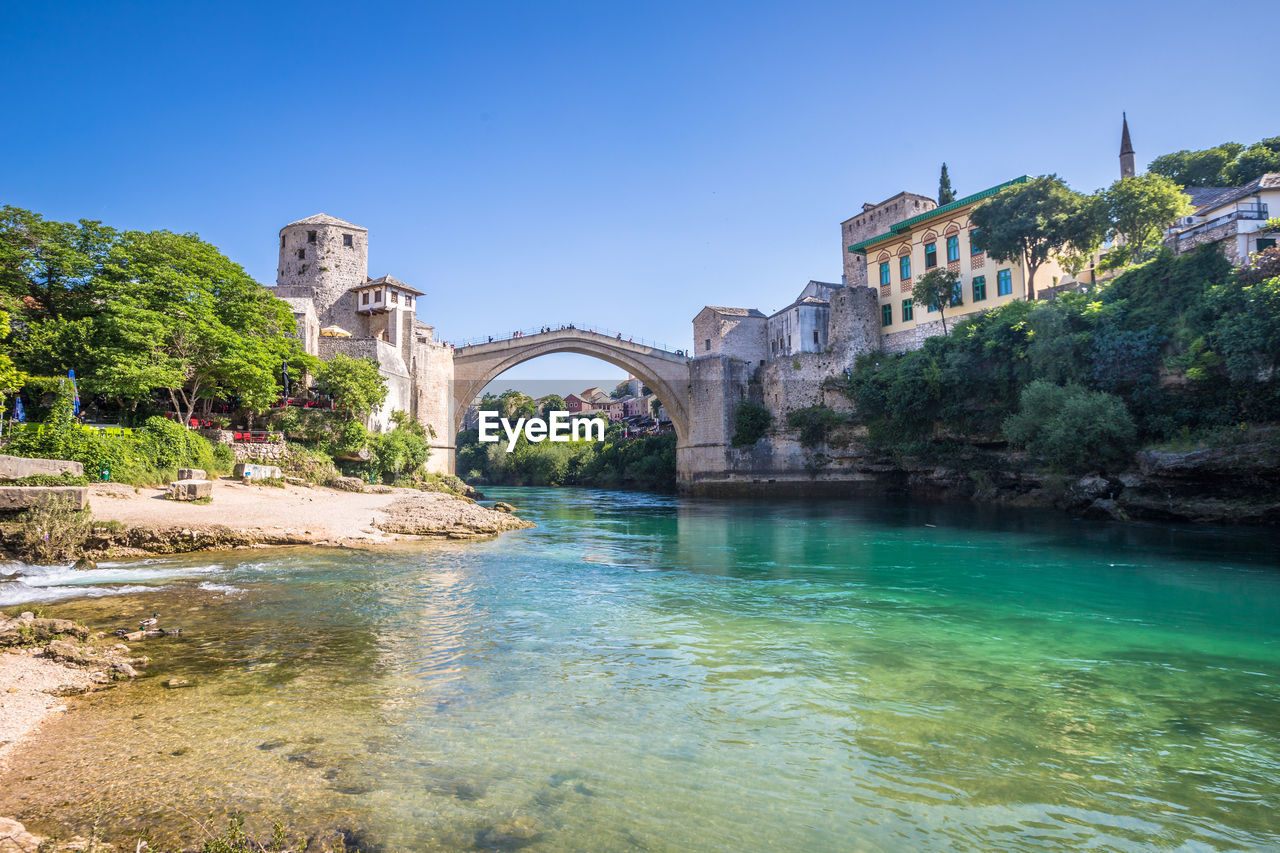 ARCH BRIDGE OVER RIVER