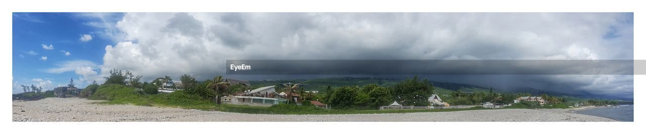 PANORAMIC VIEW OF MOUNTAINS AGAINST SKY