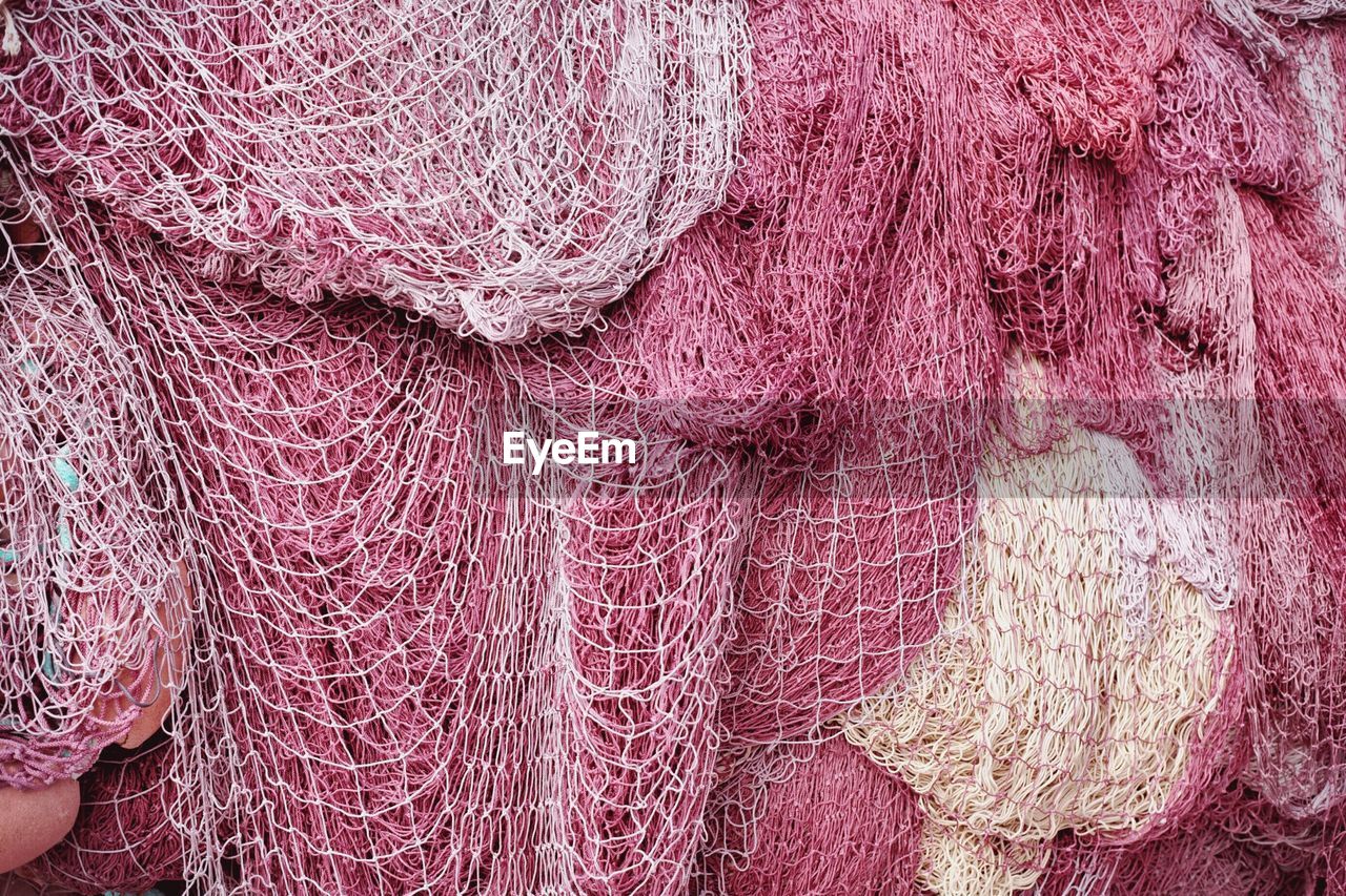 Full frame shot of red fishing nets