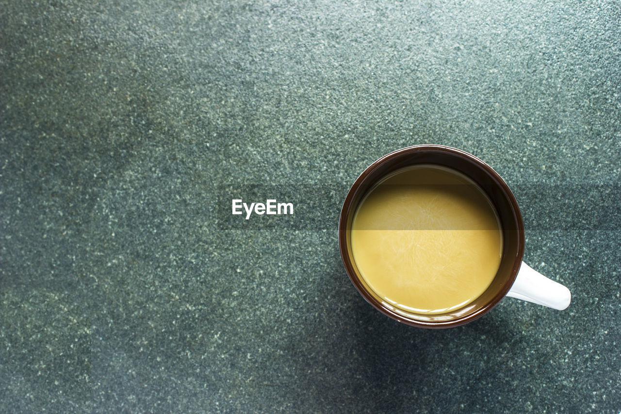 drink, cup, refreshment, food and drink, mug, tea, directly above, hot drink, high angle view, still life, coffee, table, freshness, indoors, coffee cup, no people, tea cup, close-up, wellbeing, copy space