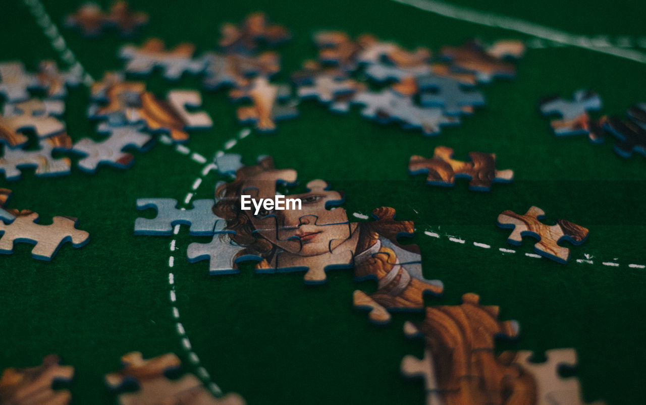 High angle view of puzzle pieces on table