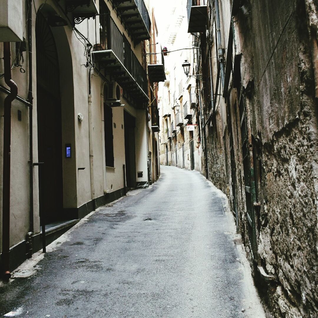 STREET AMIDST BUILDINGS