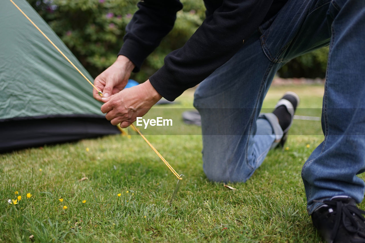 Setting up a tent for camping