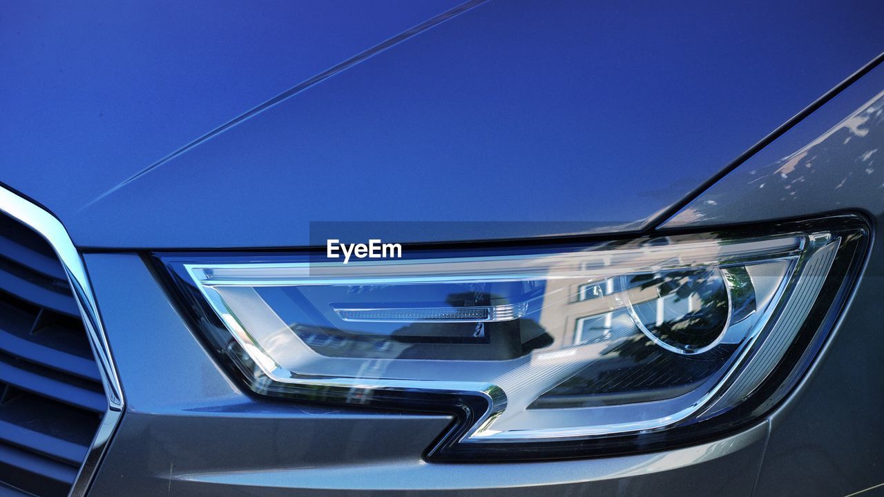 Close-up of car against clear sky