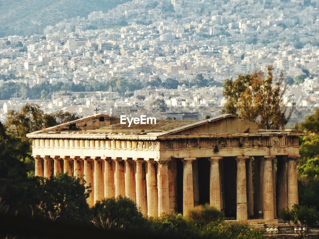 Parthenon on acropolis against residential district