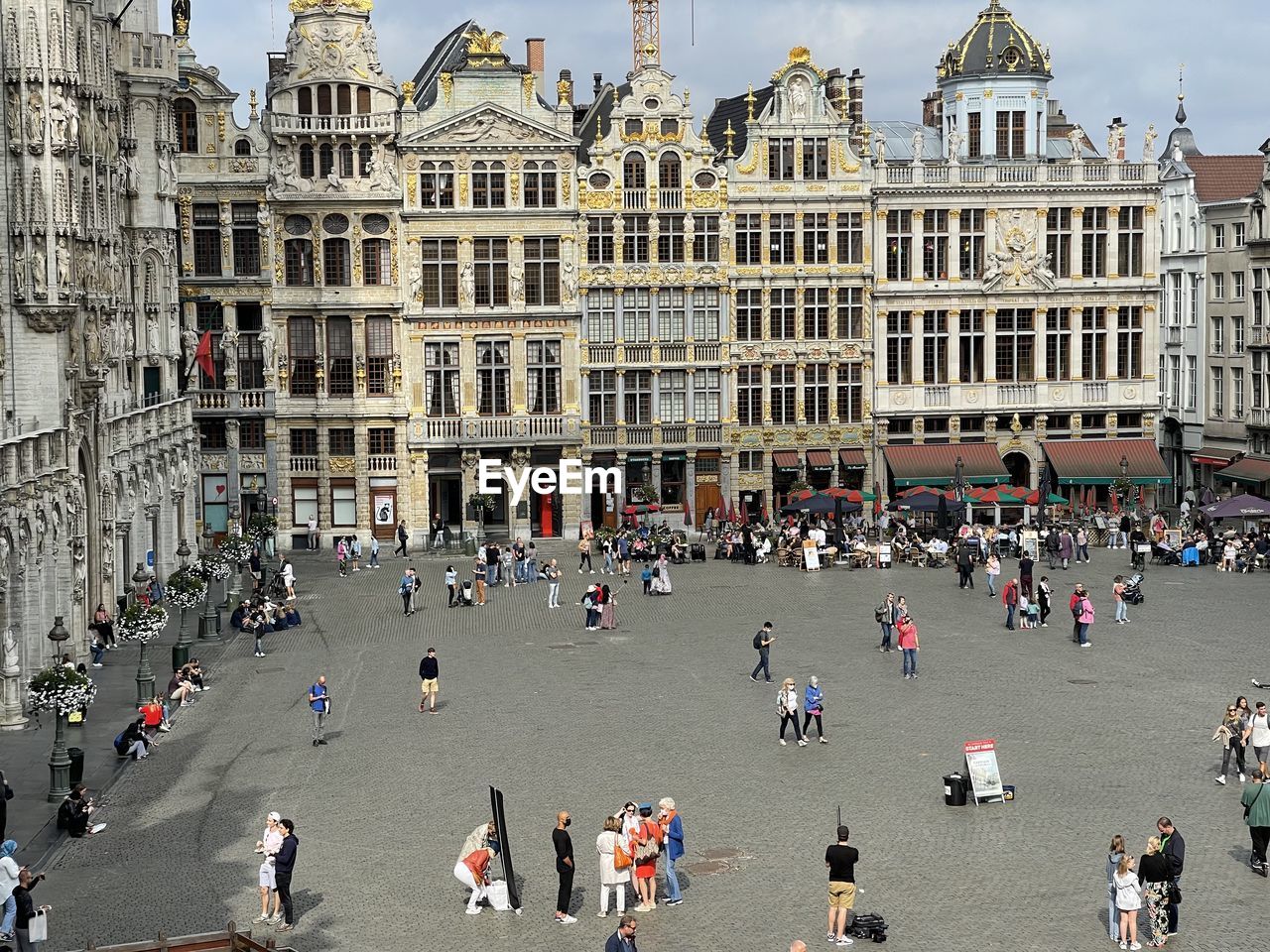 GROUP OF PEOPLE IN HISTORIC BUILDING