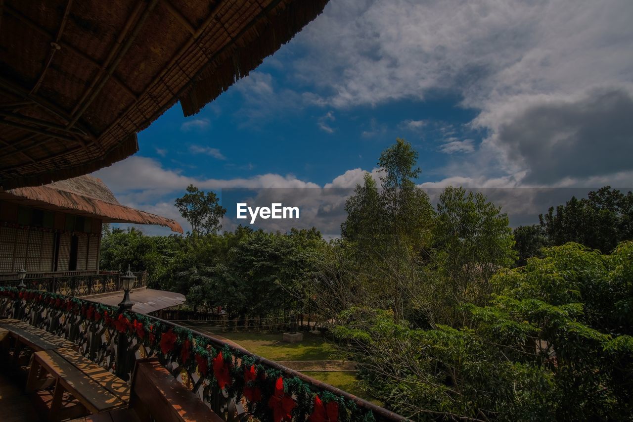 VIEW OF TEMPLE AGAINST CLOUDY SKY