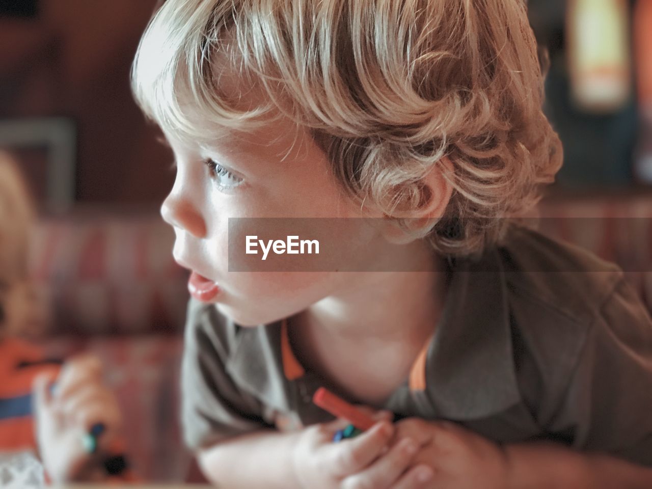 Close-up of boy looking away