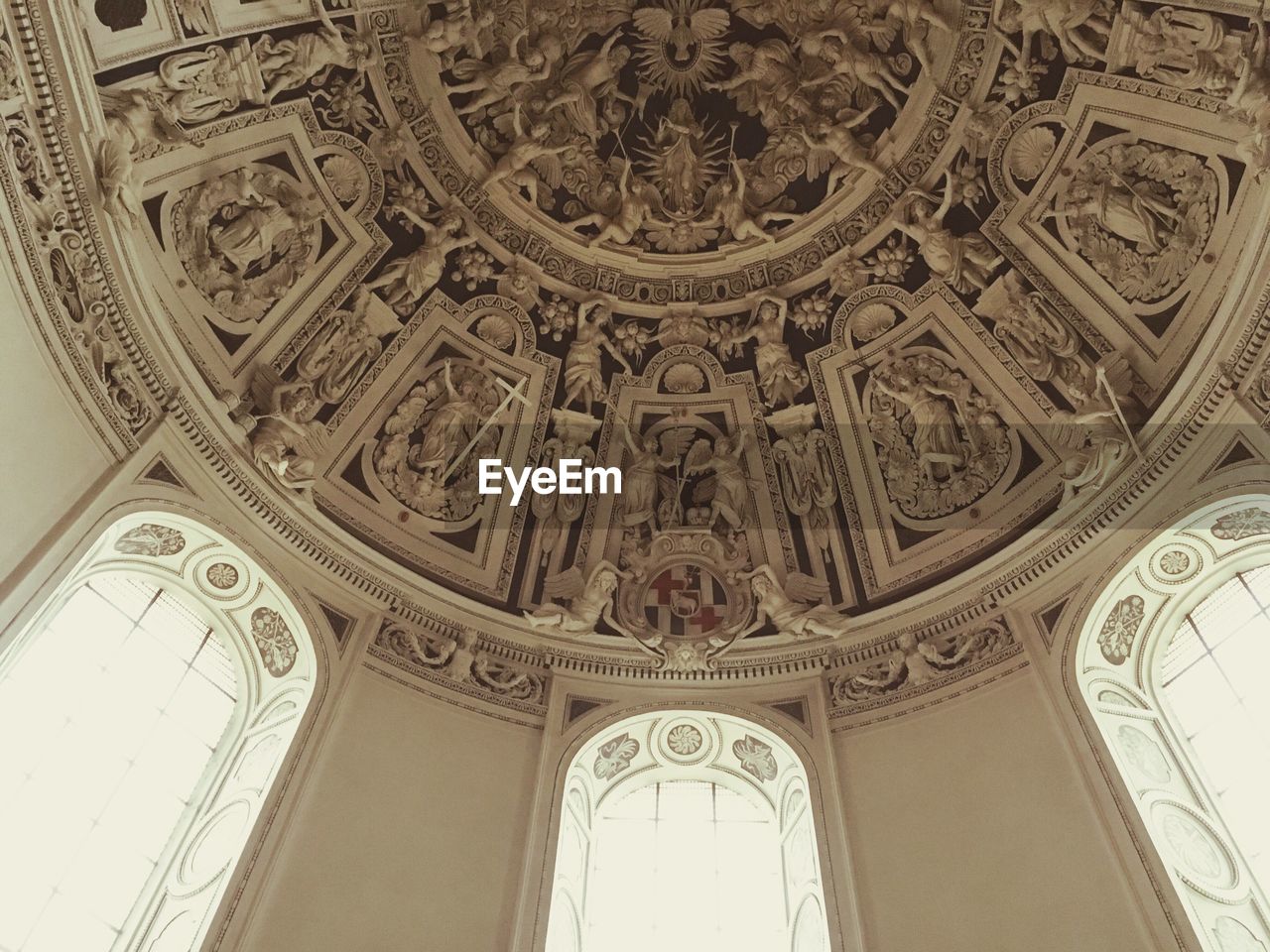 LOW ANGLE VIEW OF CEILING OF HISTORIC BUILDING