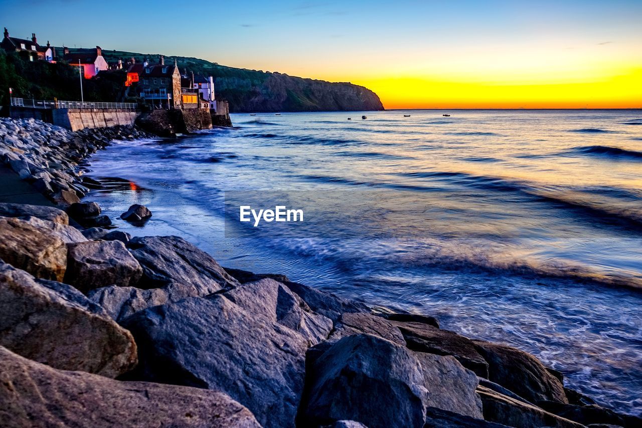 VIEW OF SEA AT SUNSET