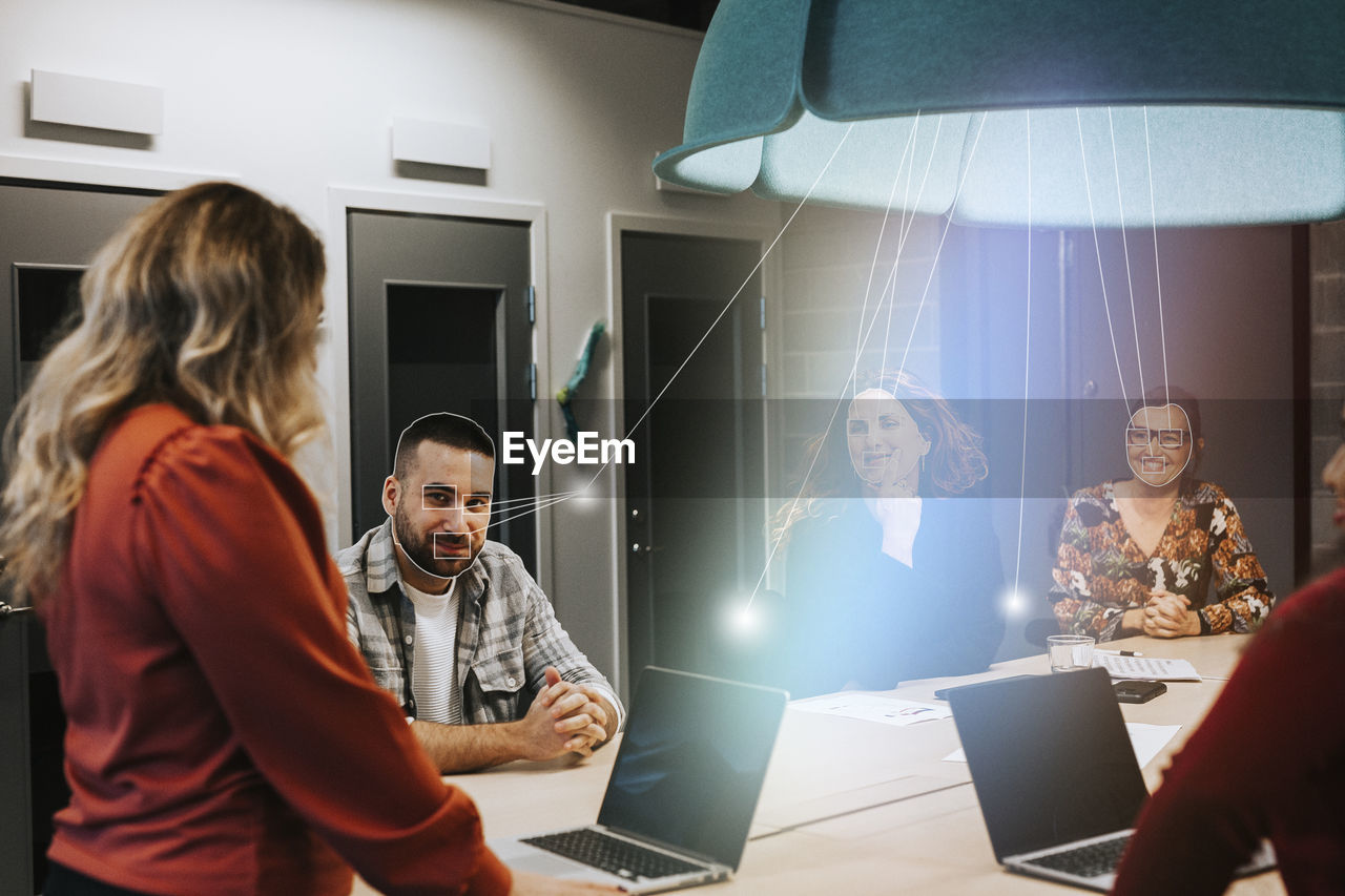 Business people having meeting in office