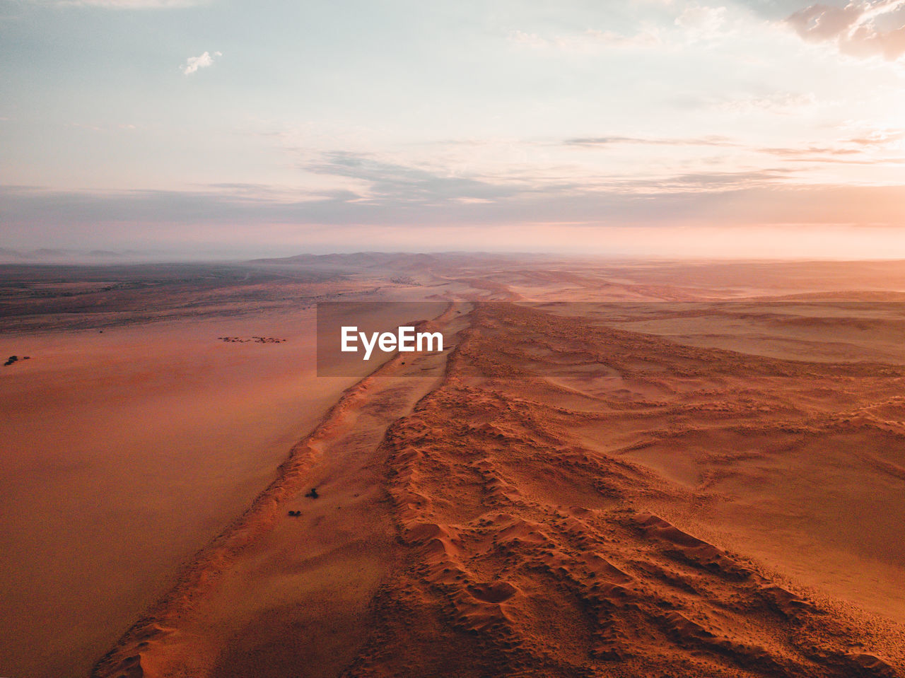 Scenic view of desert against sky