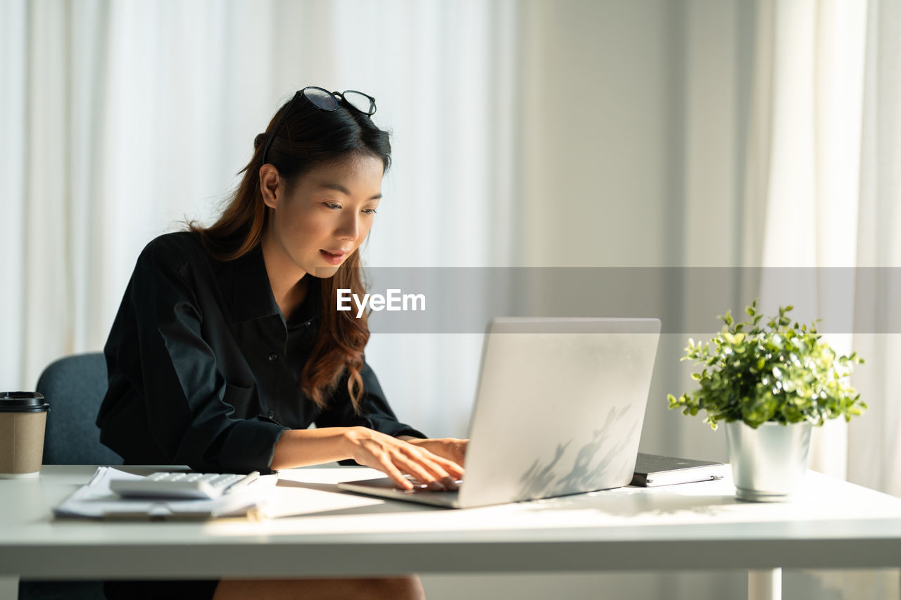 Businesswoman working at office