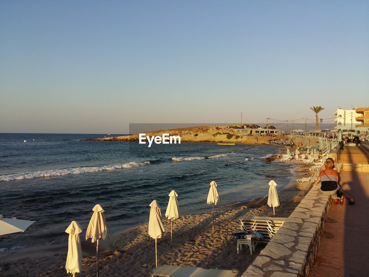 Scenic view of sea against clear sky