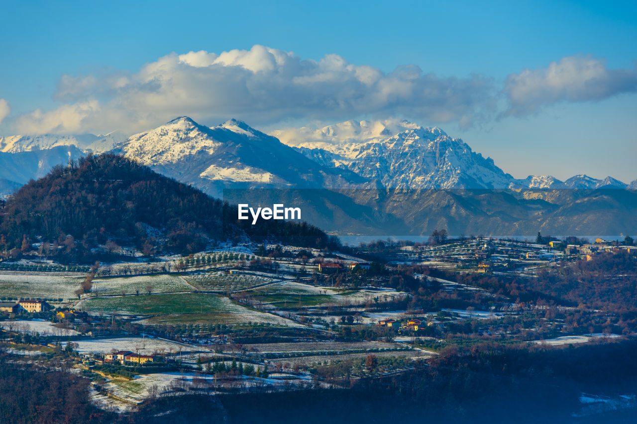 Majestic view of the snow-covered carega complex from the sovizzo hills in vicenza italy